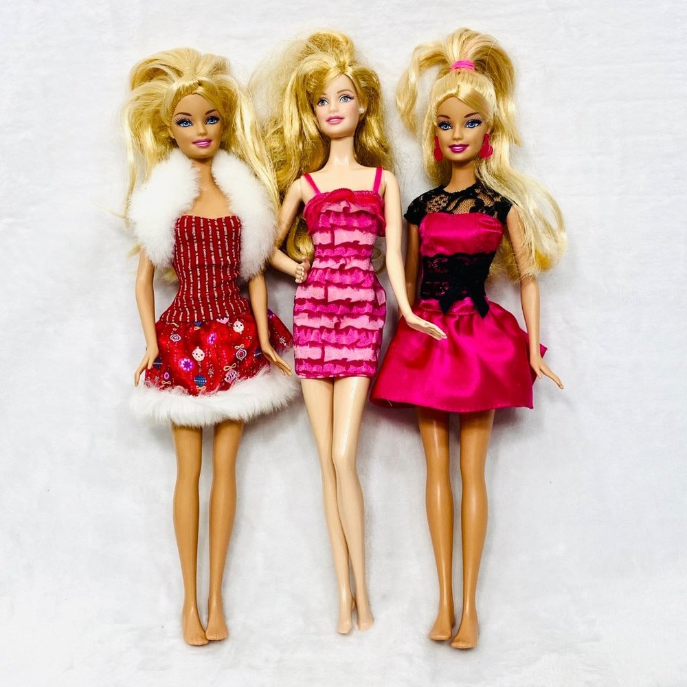 Lot of Three Barbies with Dresses